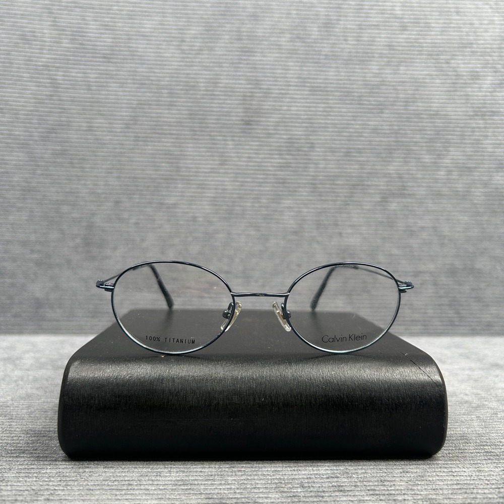 Calvin Klein 545 Titanium Oval y2k Eyeglasses Frame Japan 140 Dark Blue Gray vtg